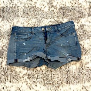 Jean shorts with distressed detail